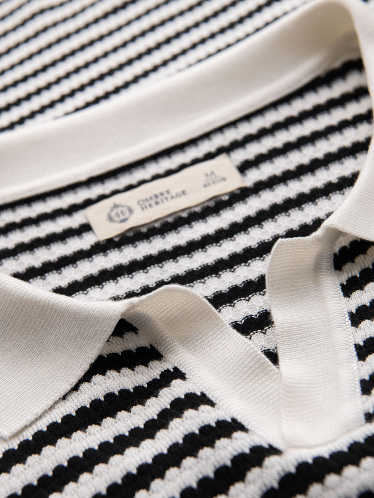 Ombre Men's knitted buttonless polo shirt with navy stripes - black and white