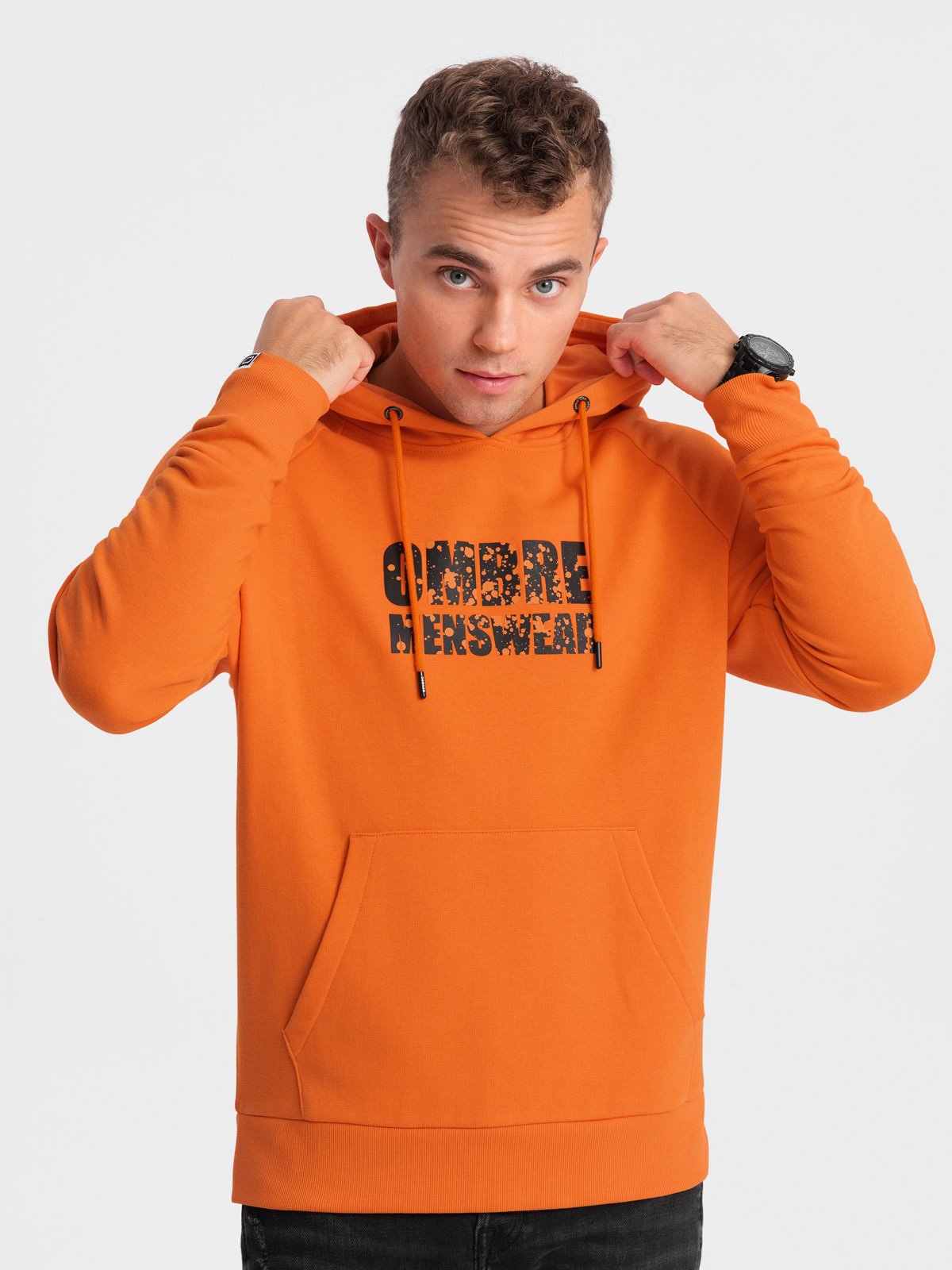 Levně Ombre Men's kangaroo sweatshirt with hood and print - orange