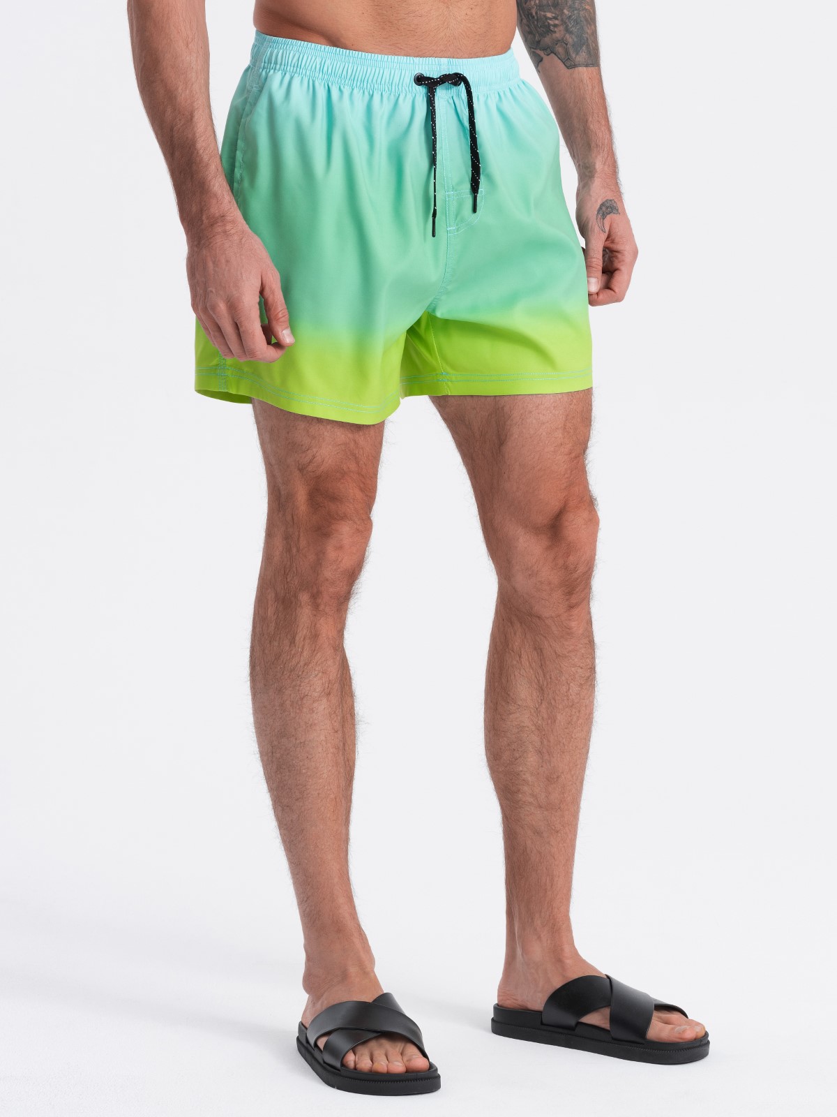 Levně Men's ombre effect swim shorts - light turquoise