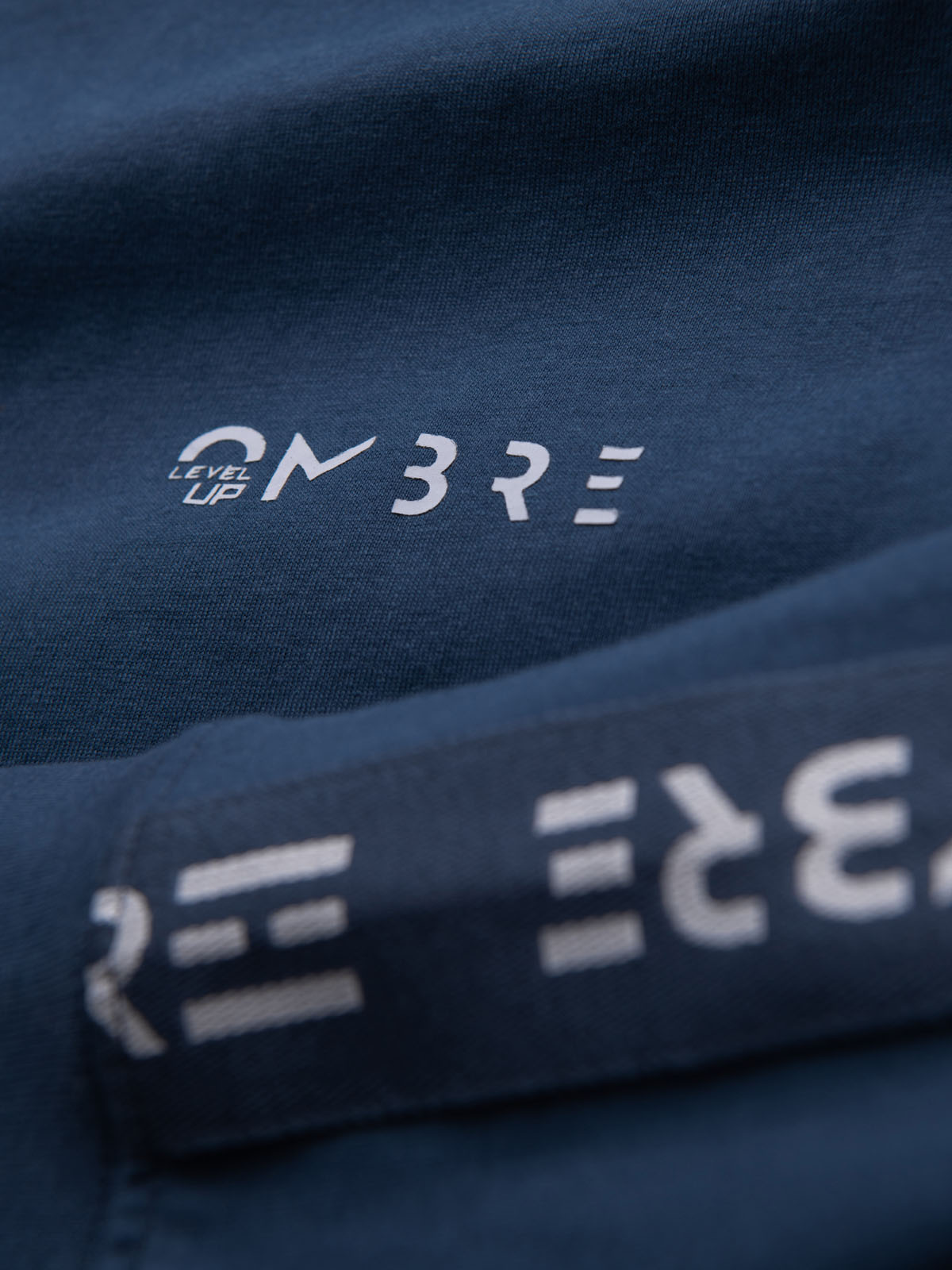 Ombre Men's cotton U-neck longsleeve with piping and chest print - dark blue