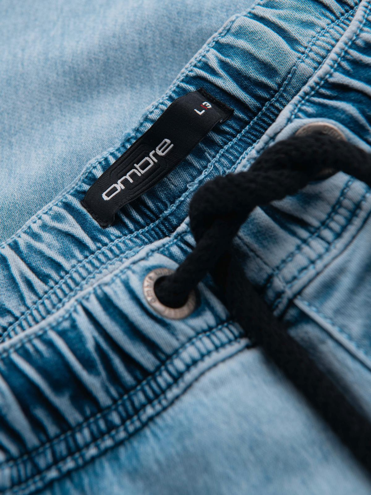 Ombre Men's short denim shorts with decorative stitching - light blue