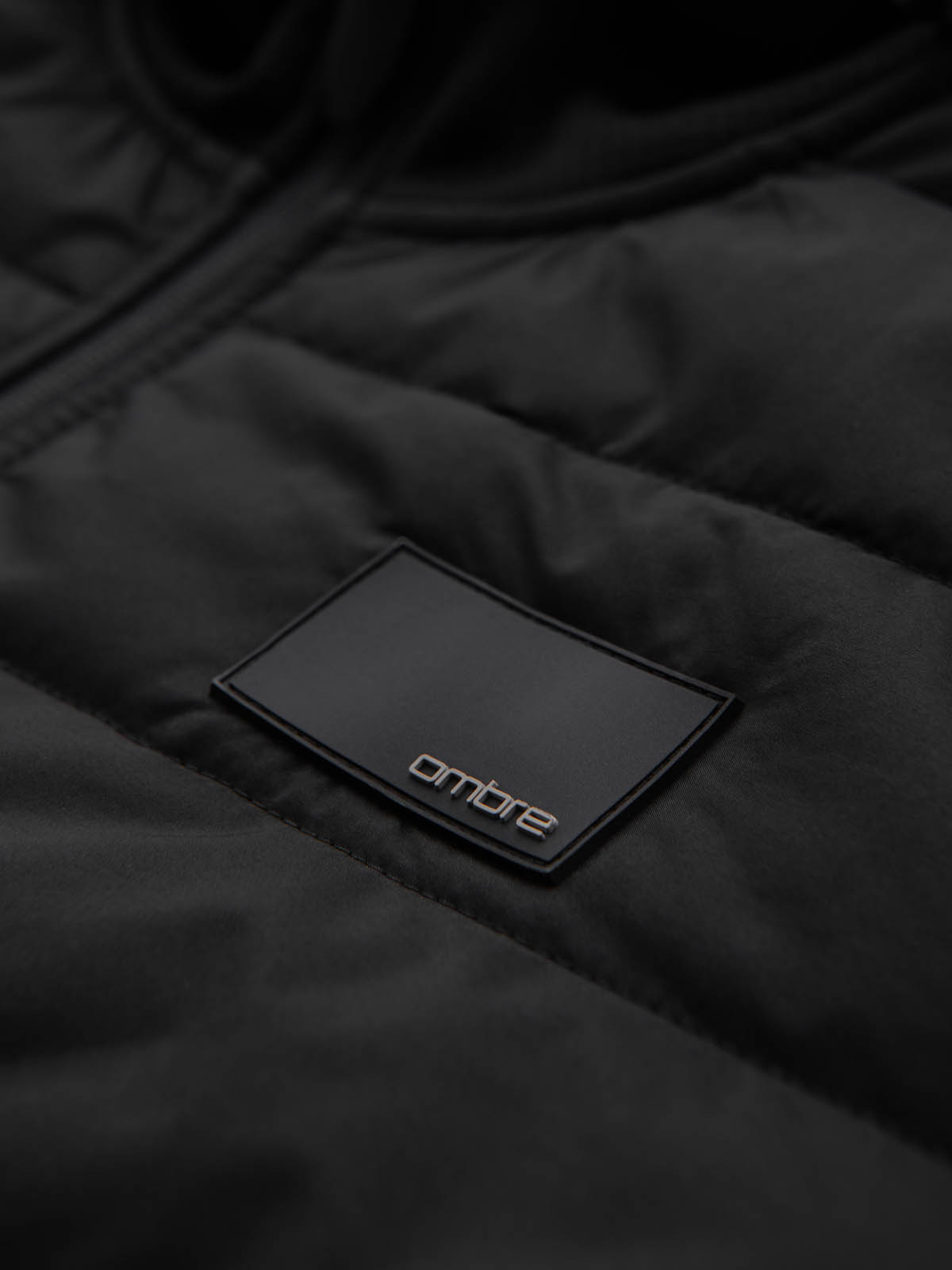 Ombre Men&#039;s lightweight jacket of combined materials with hood and decorative quilting - black