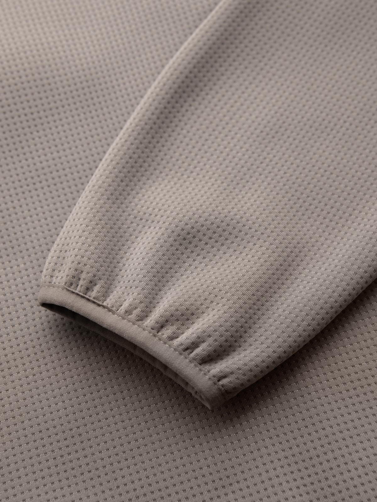 Ombre Men&#039;s lightweight jacket of combined materials with hood and decorative quilting - ash