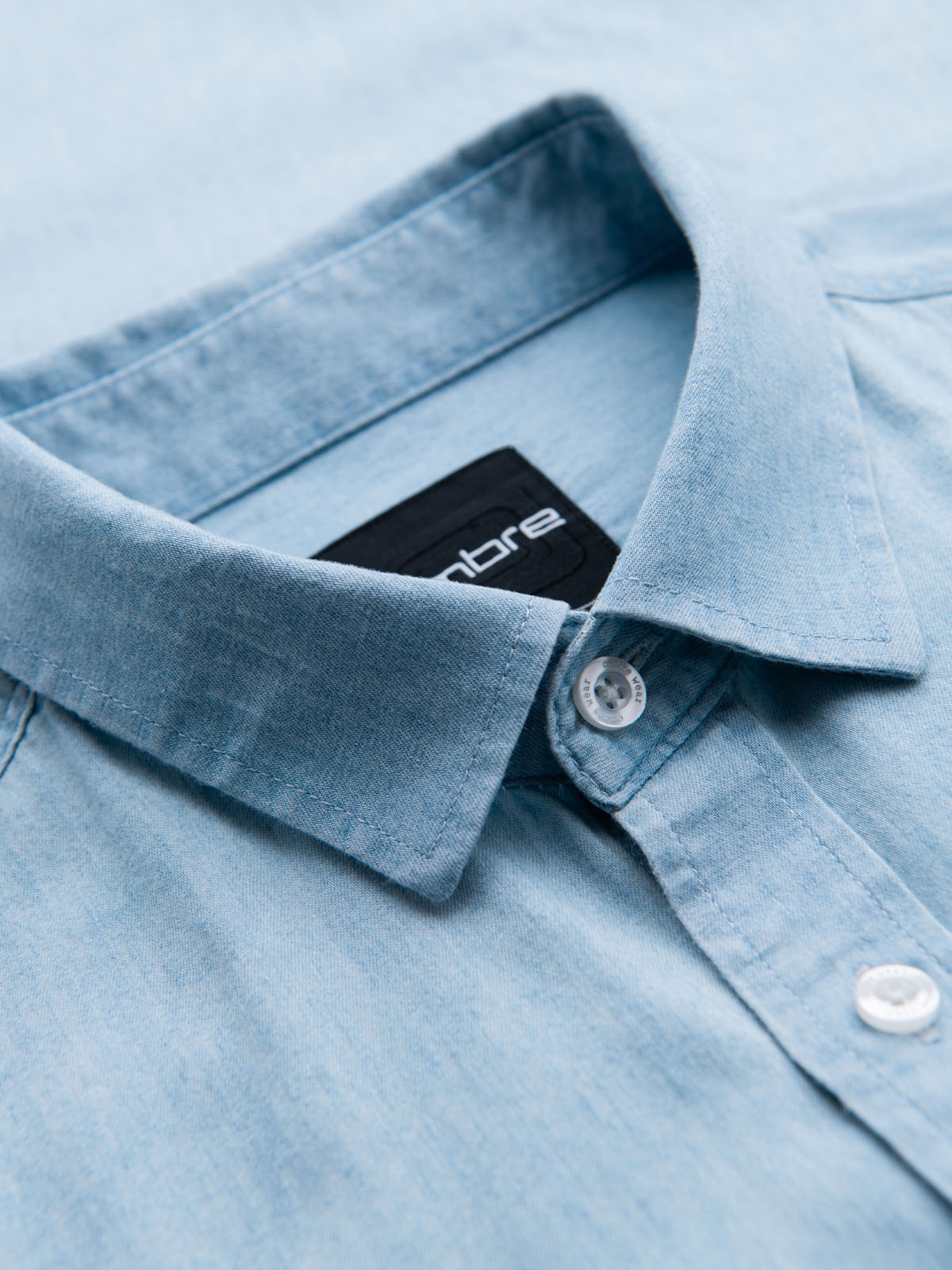 Ombre Men&#039;s denim shirt with embroidered pocket - light blue