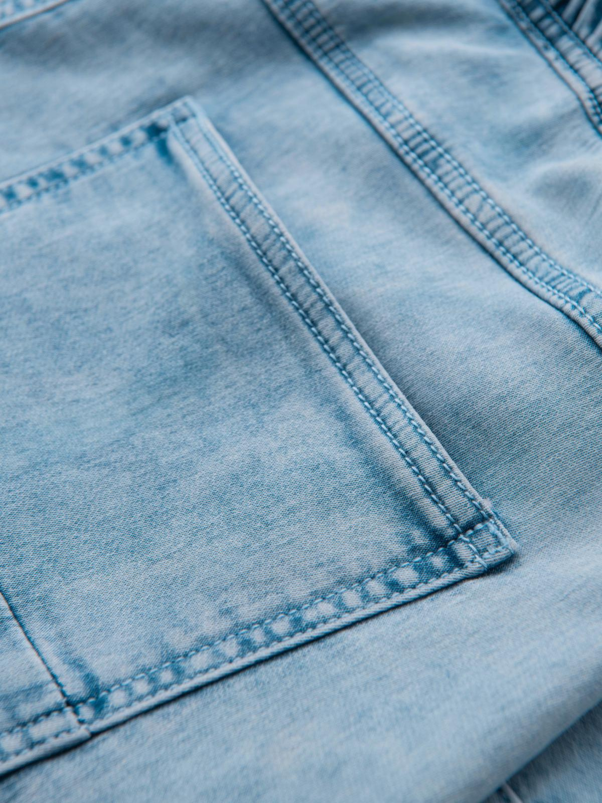 Ombre Men's short denim shorts with decorative stitching - light blue