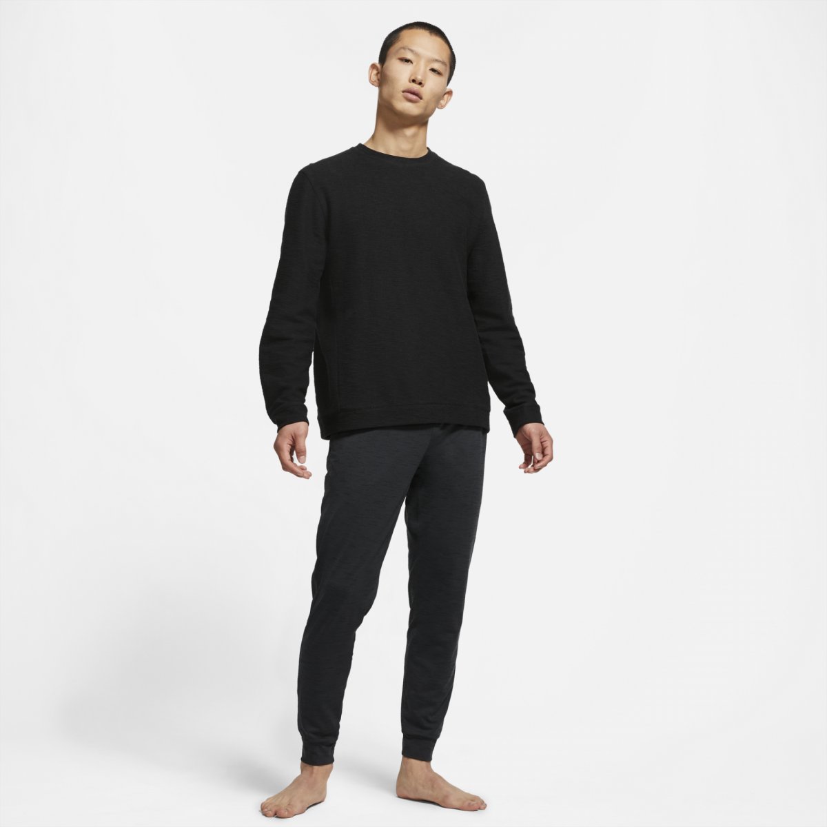 Levně Nike Man's Sweatpants Yoga Dri-FIT CZ2208-010