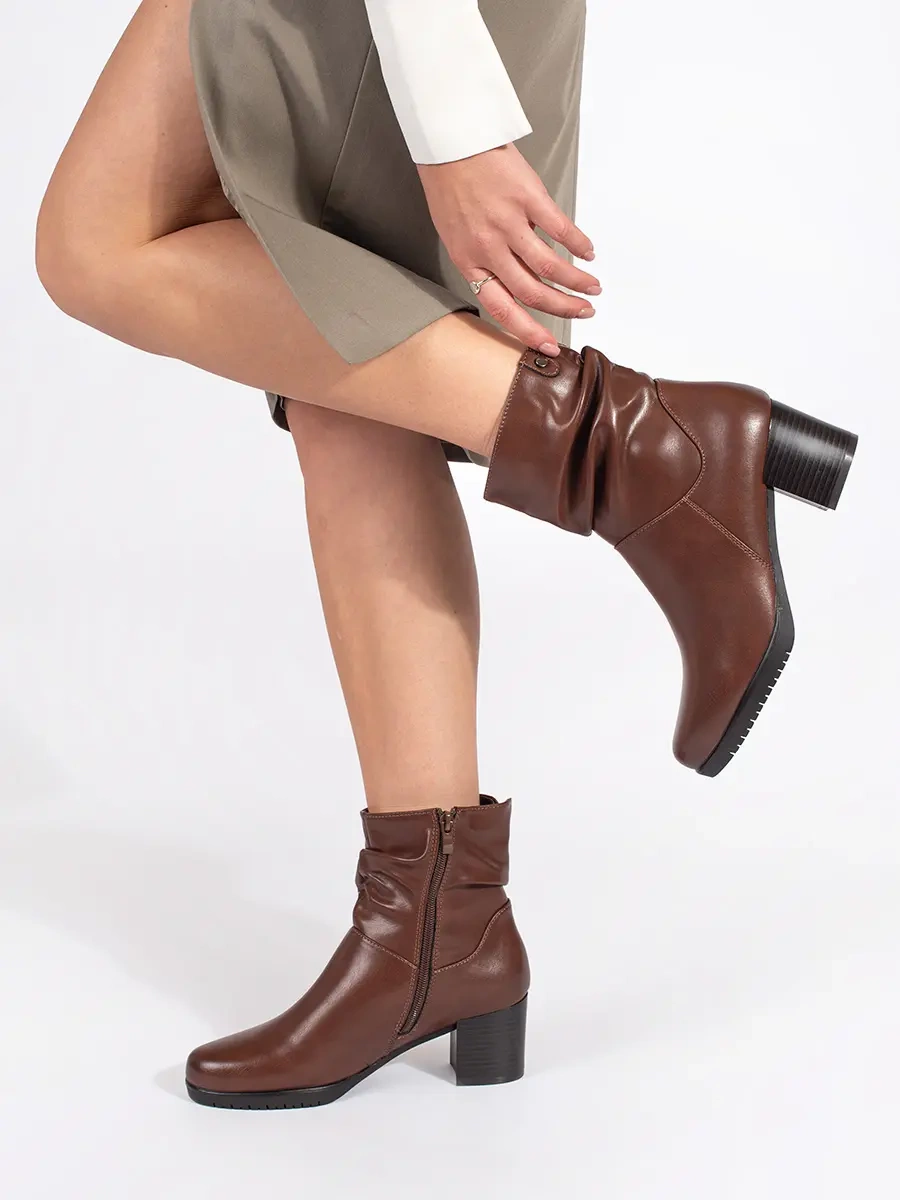 Womens brown leather ankle boots with a crinkled upper by Sergio Leone