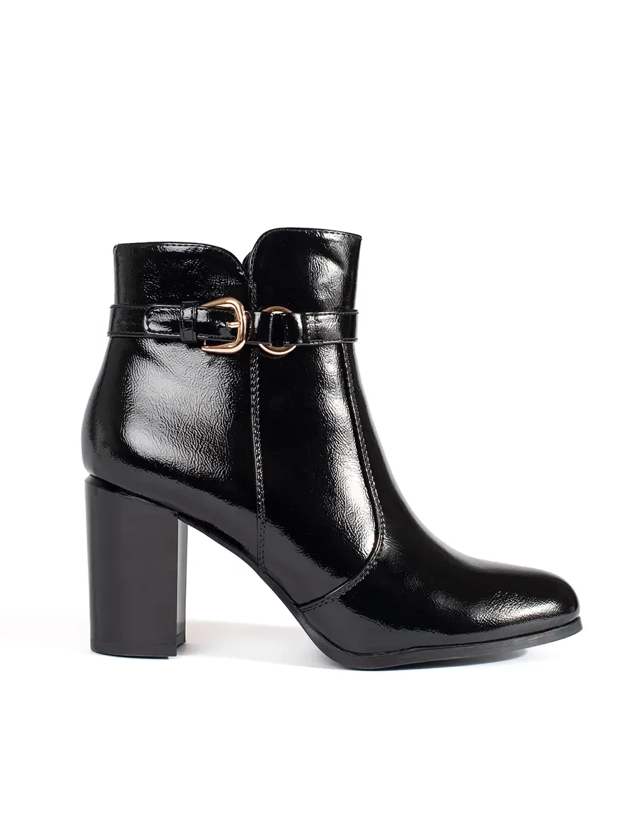 Black patent heeled boots by Sergio Leone