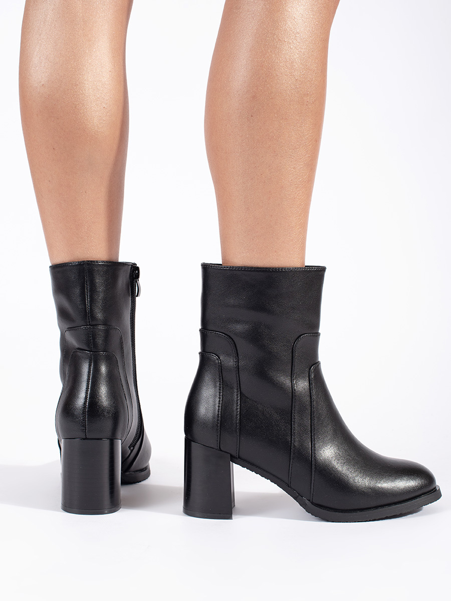 Womens black leather ankle boots on a stiletto heel by Sergio Leone