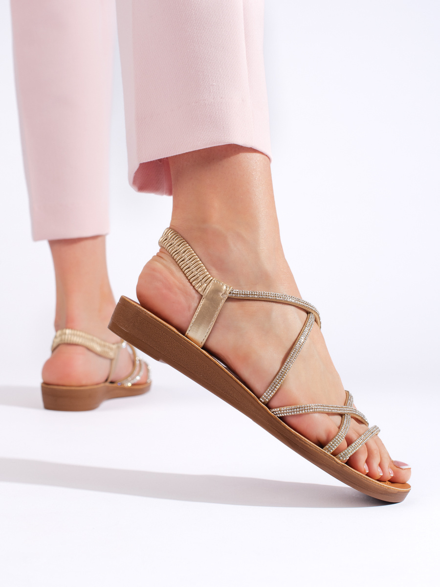 Shelvt Slip-on gold sandals with cubic zirconia