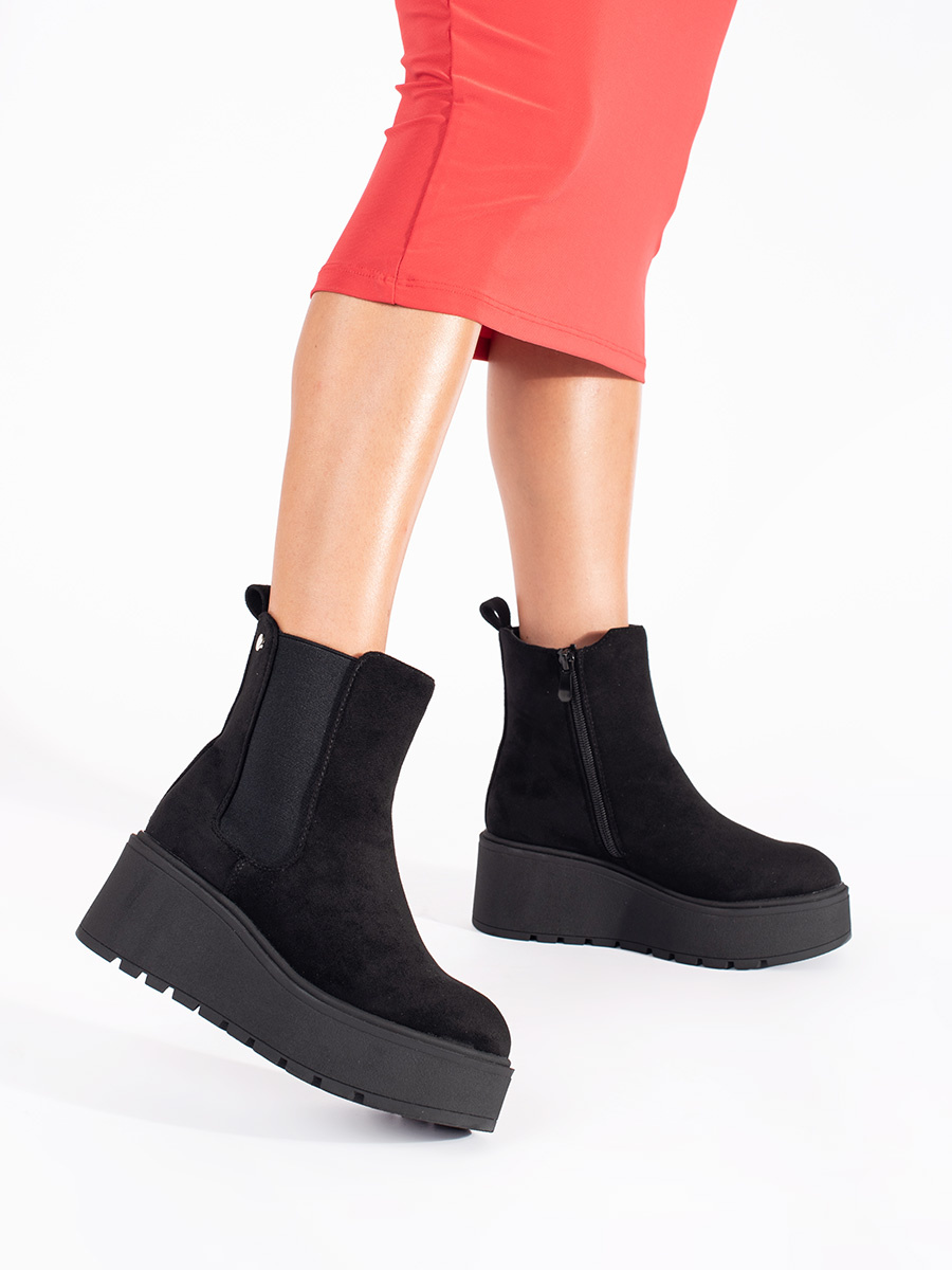 Shelvt Black suede Chelsea boots on a wedge