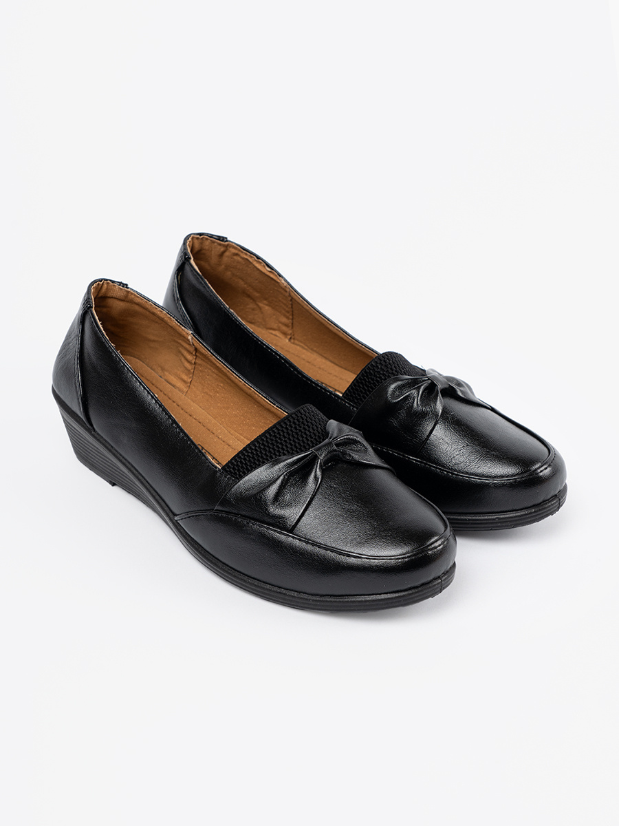 Shelvt Black slip-on shoes with a bow