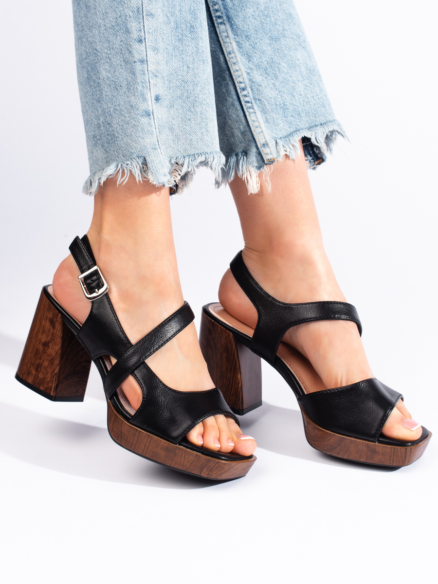 Black sandals with a wide heel by Sergio Leone