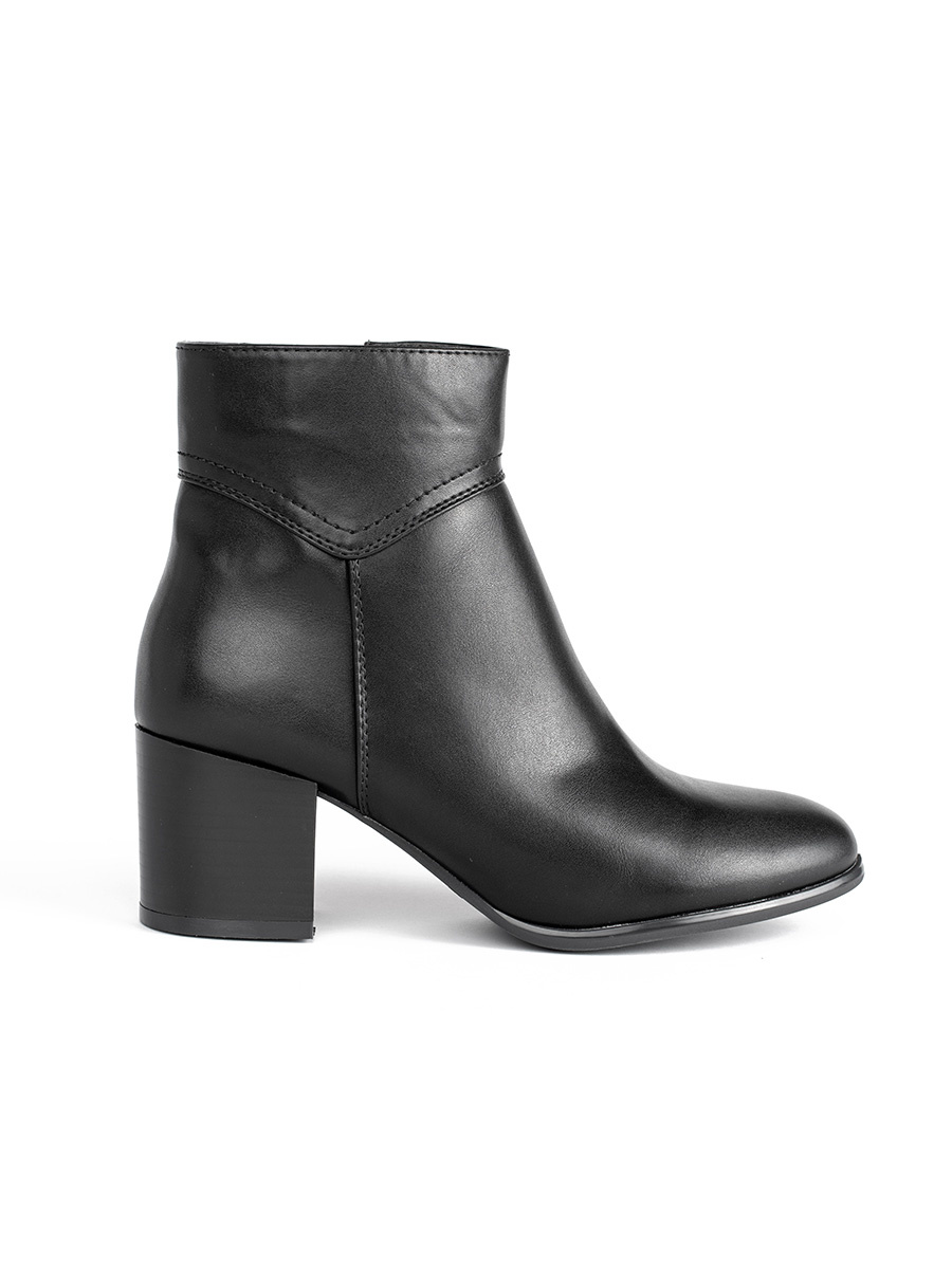 Black ankle boots on a block by Sergio Leone