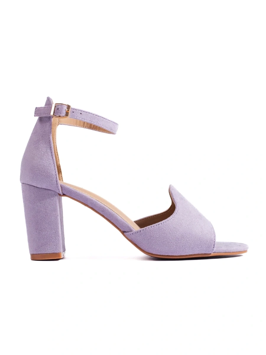 Purple womens sandals on a post W. Potocki