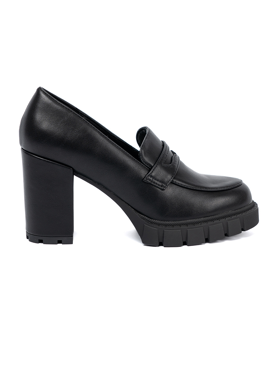Shelvt Black loafers on a post with a trapper sole