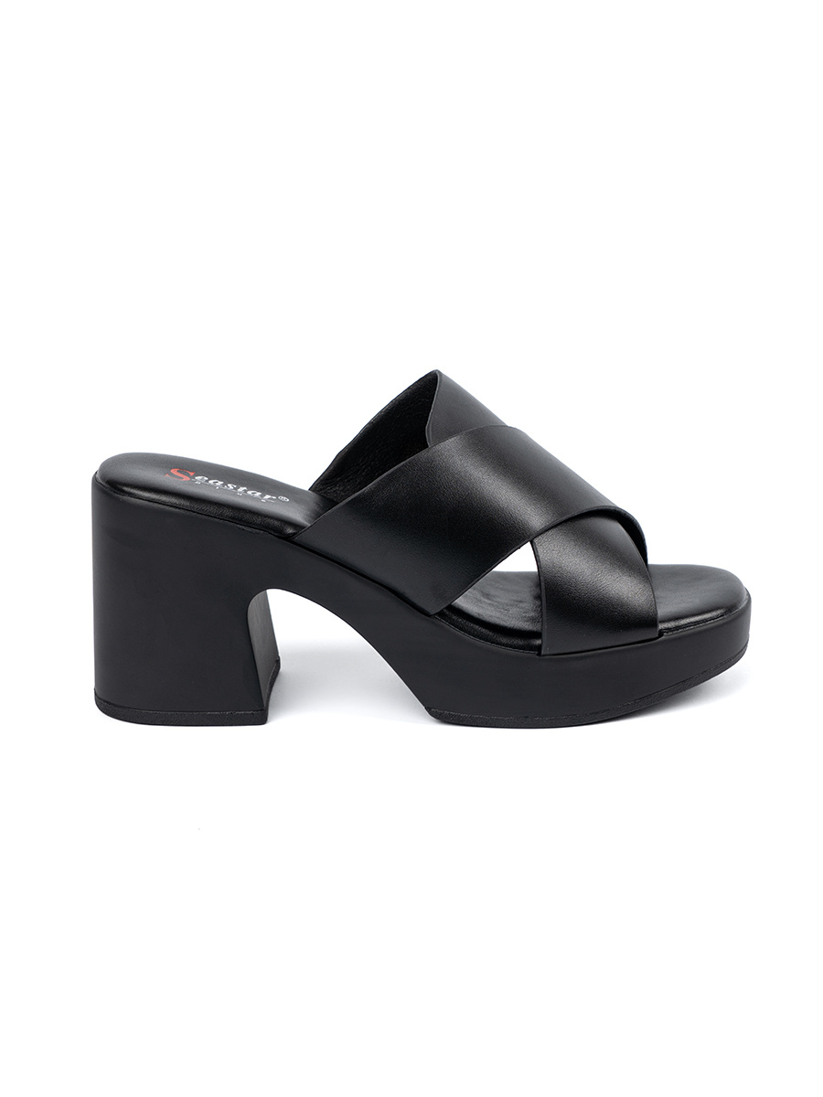 SEASTAR Black mules on a post