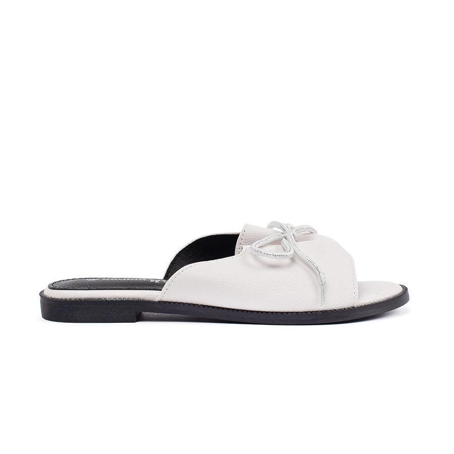 GOODIN White flip-flops with a bow