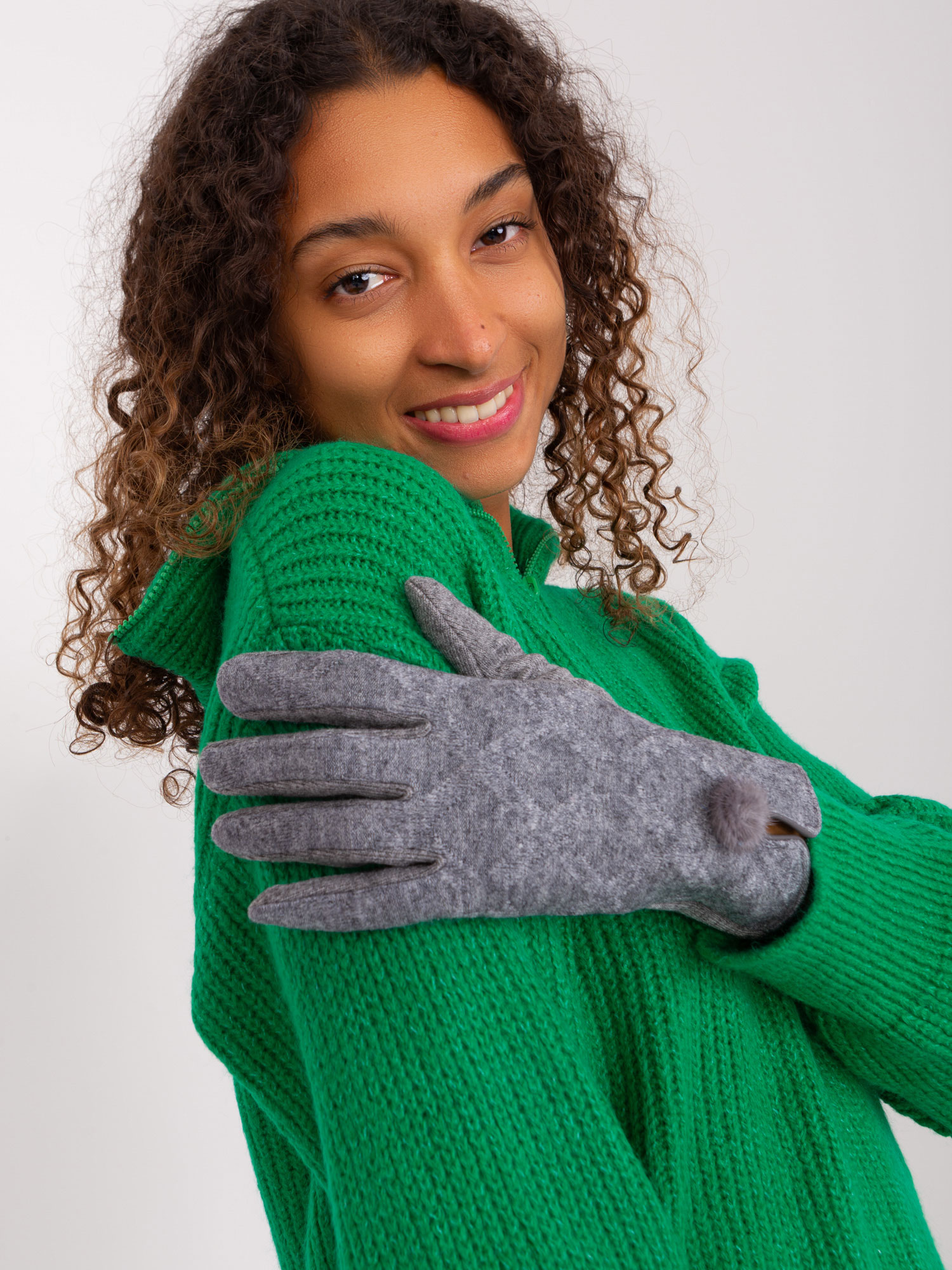 Dark grey tactile gloves with pompom