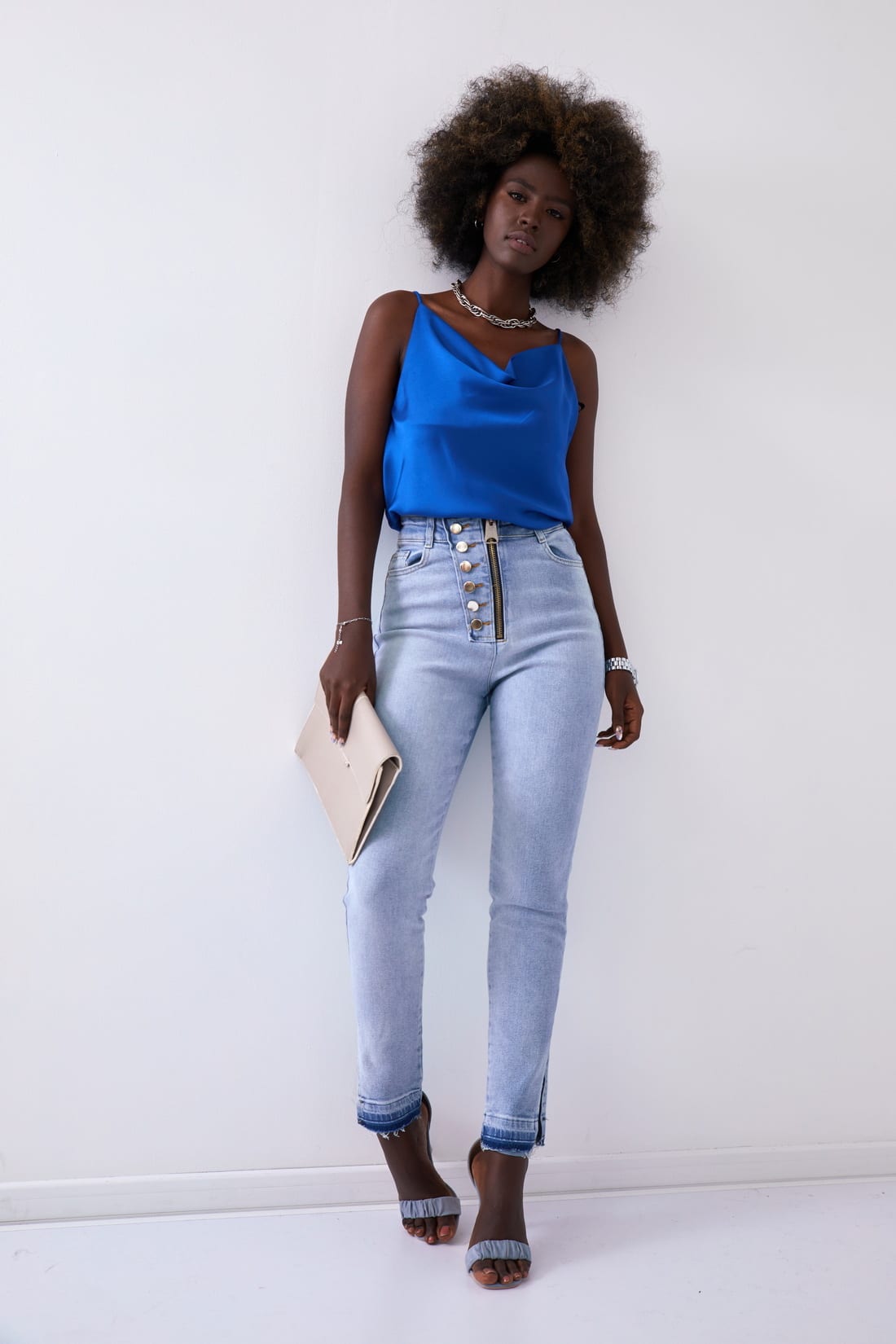 Women's denim trousers with decorative buttons