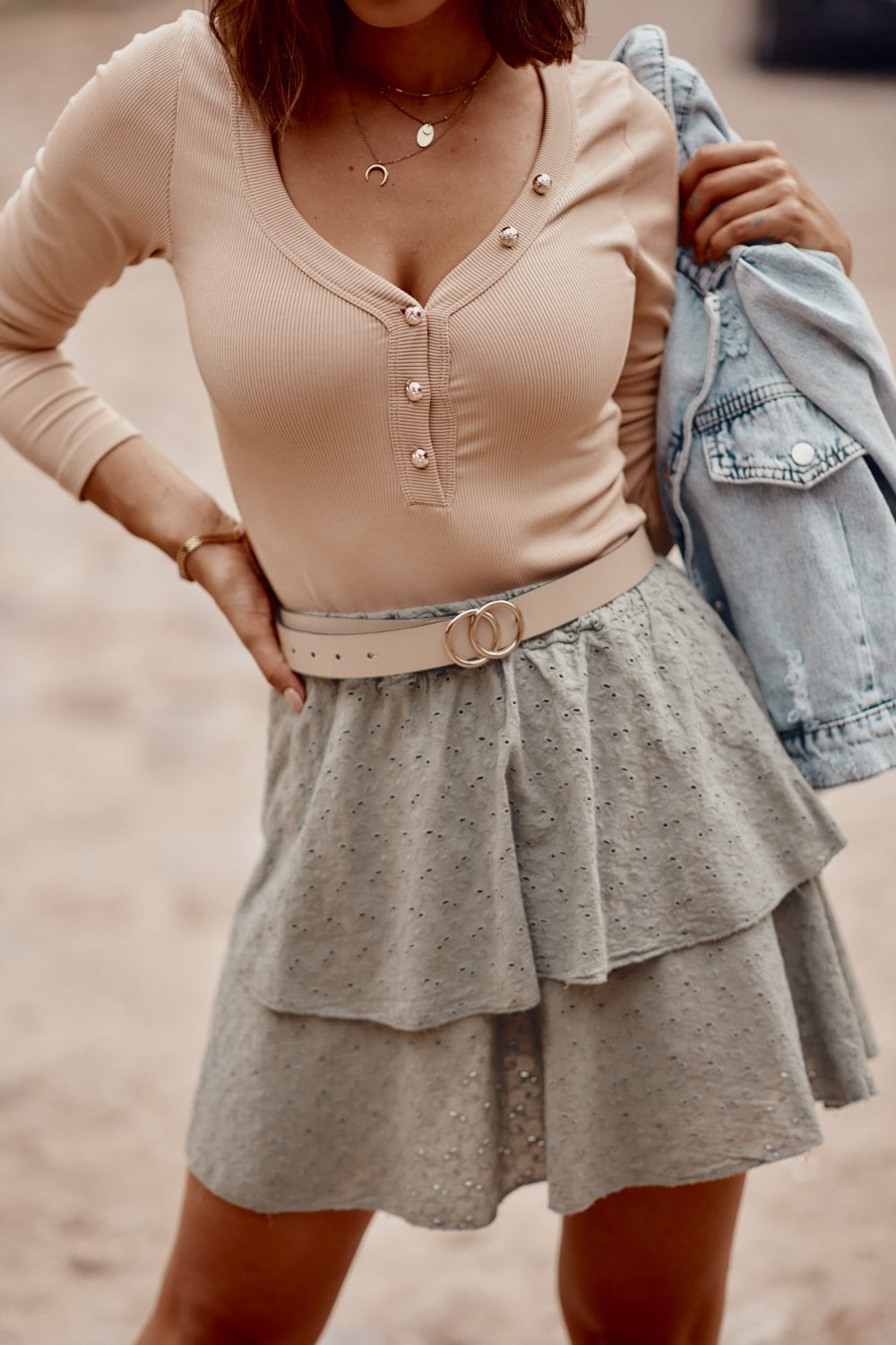 Ribbed bodysuits with beige button neckline