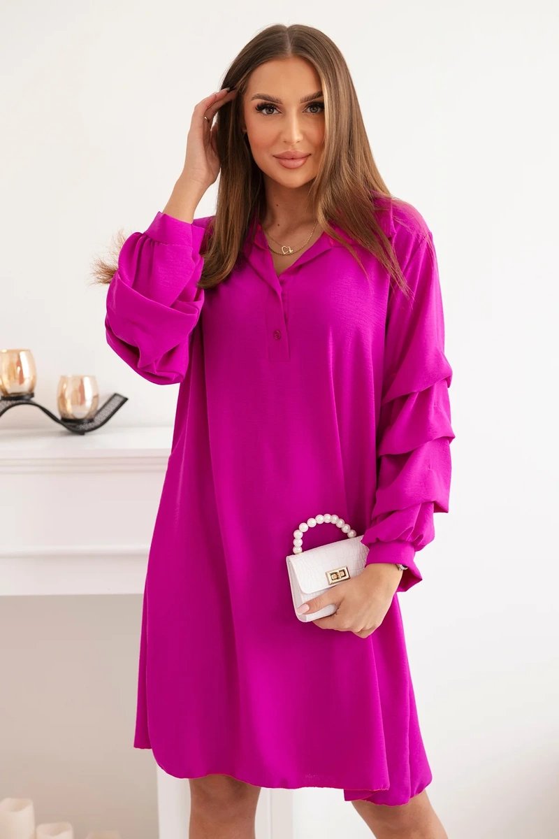 Oversized dress with decorative sleeves in fuchsia color