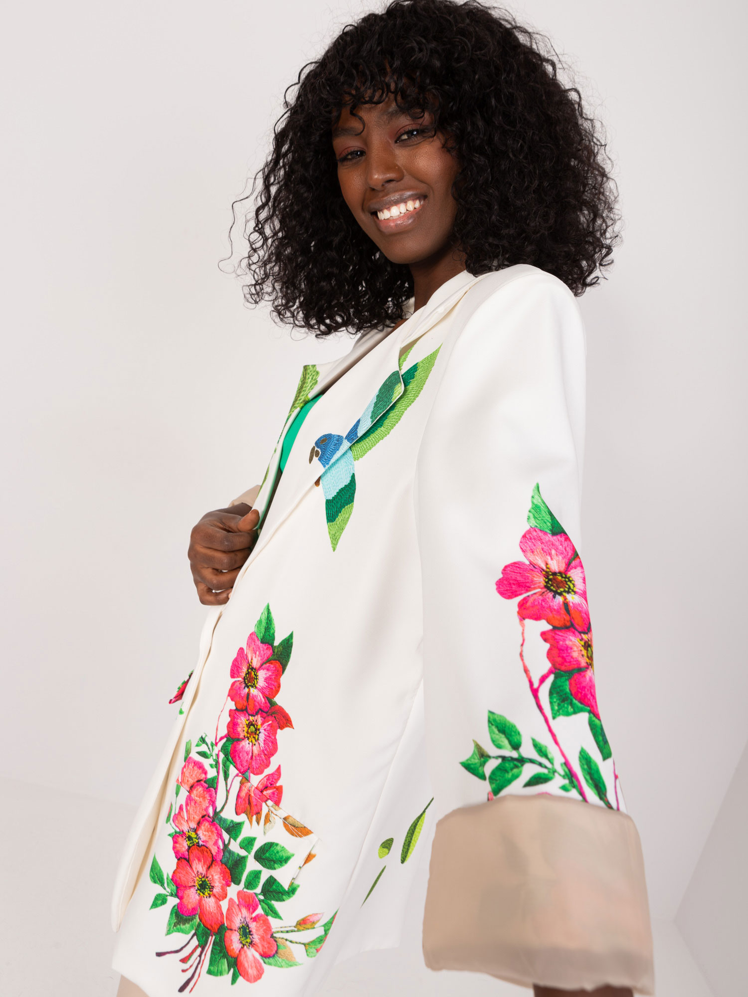 Cream jacket with a tropical print