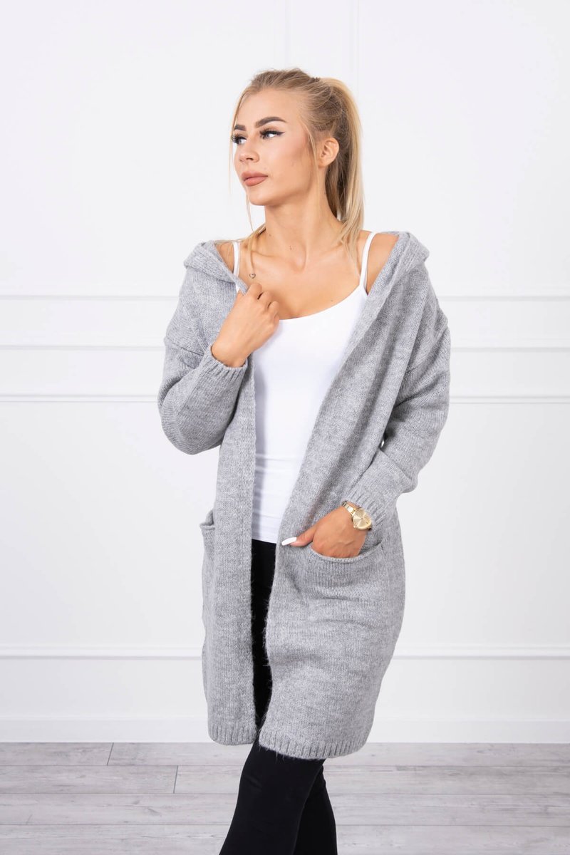 Ordinary sweater with a hood and pockets of gray color