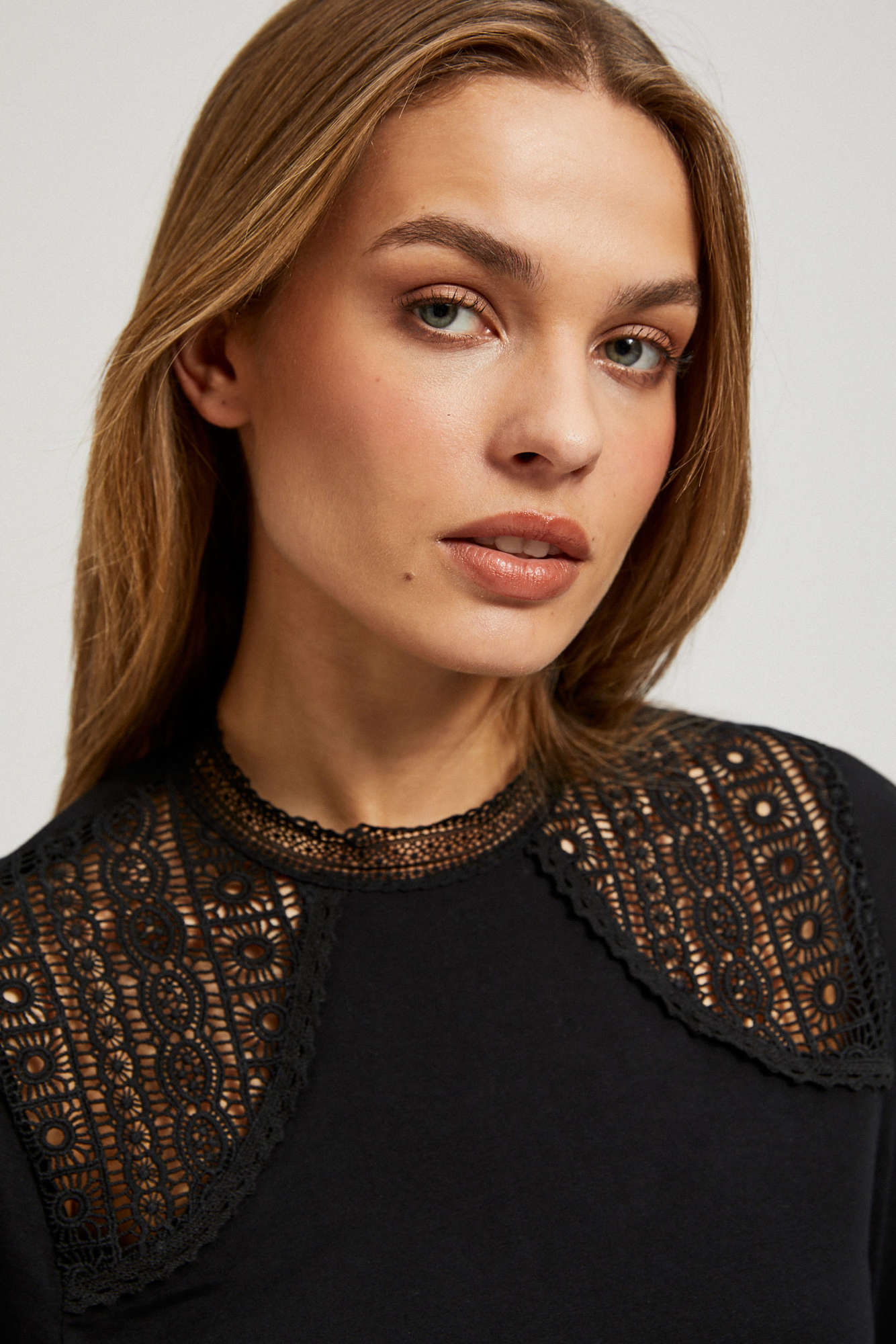 Blouse with decorative lace