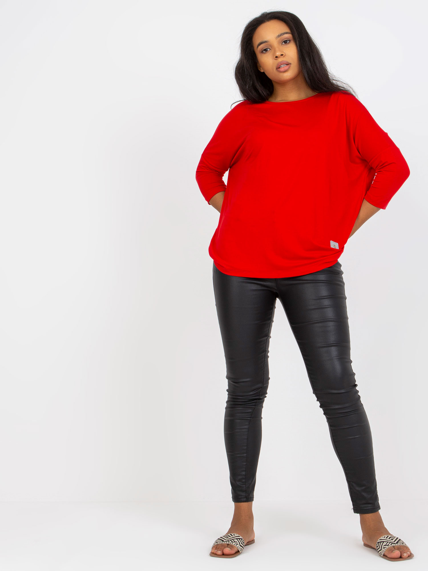 Plain red cotton blouse of larger size