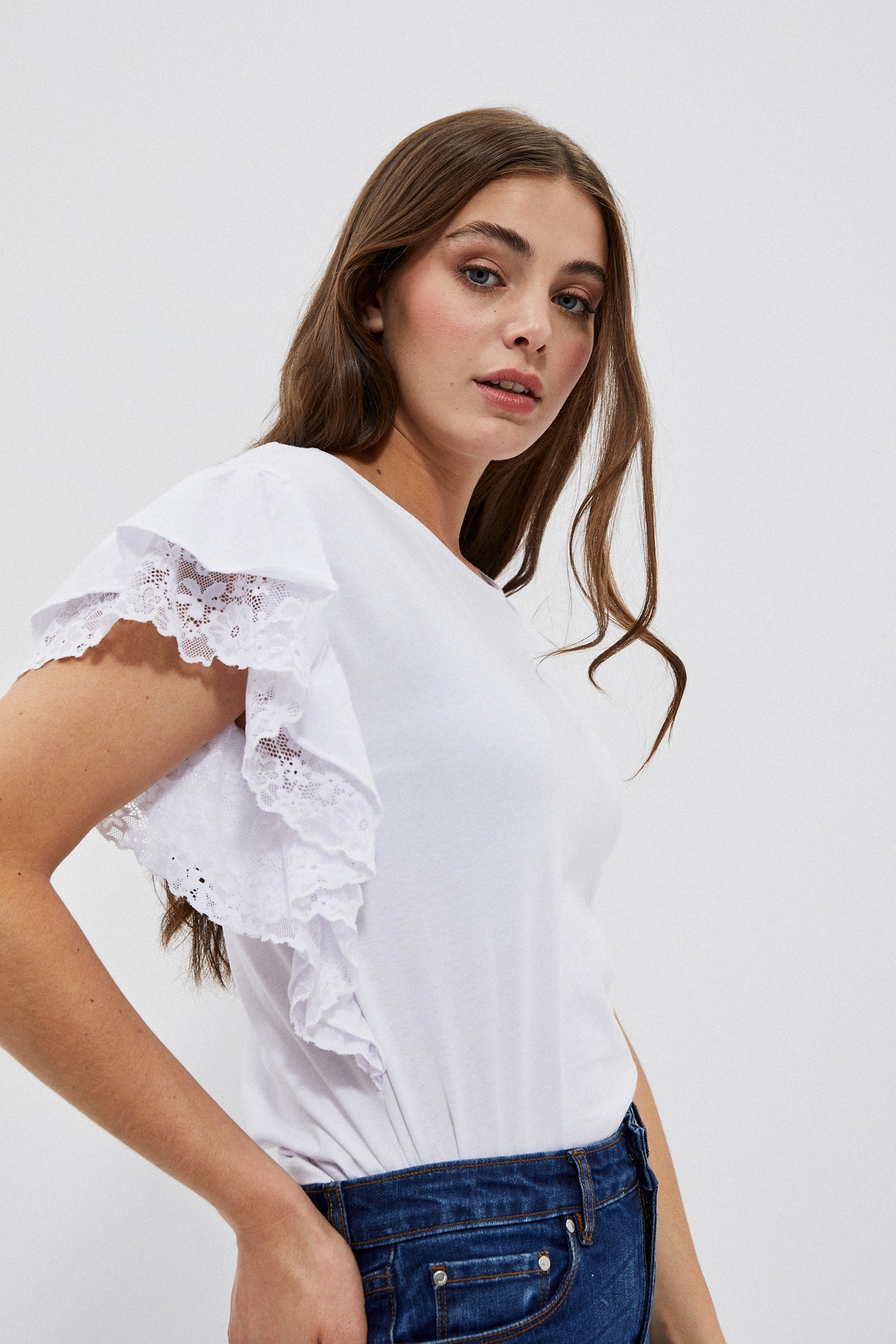 Shirt with ruffles on the shoulders