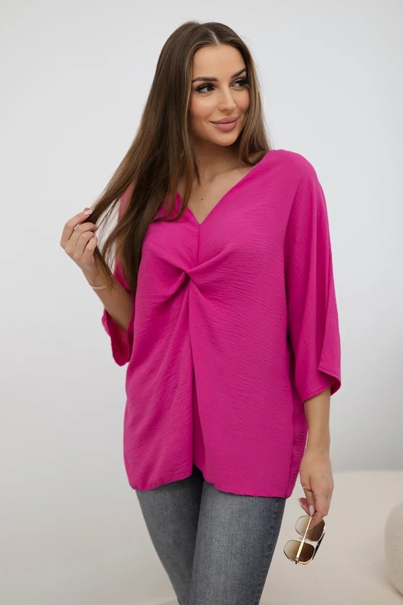 Oversized fuchsia blouse with a neckline