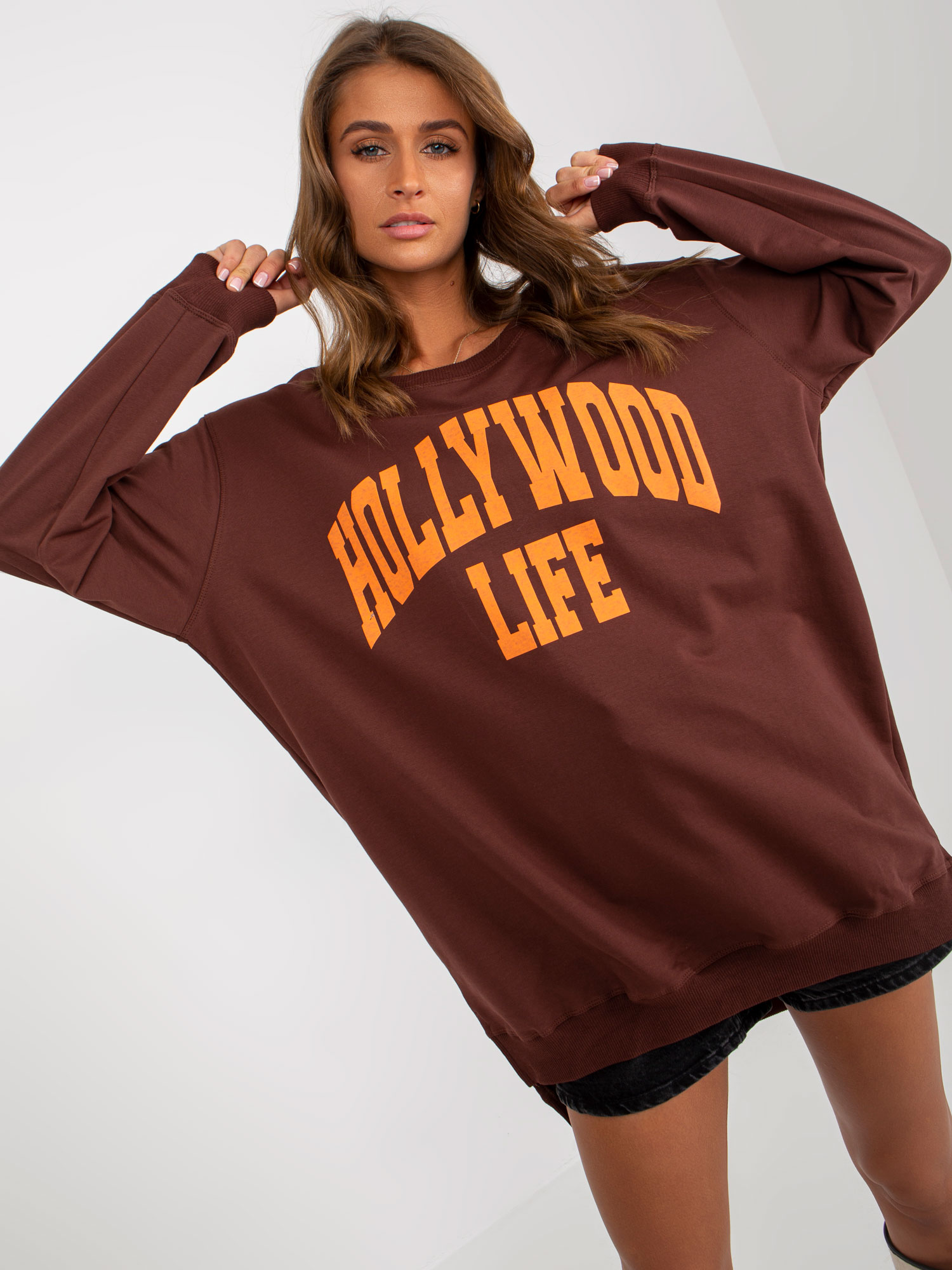 Dark brown and orange oversized long sweatshirt with slogan
