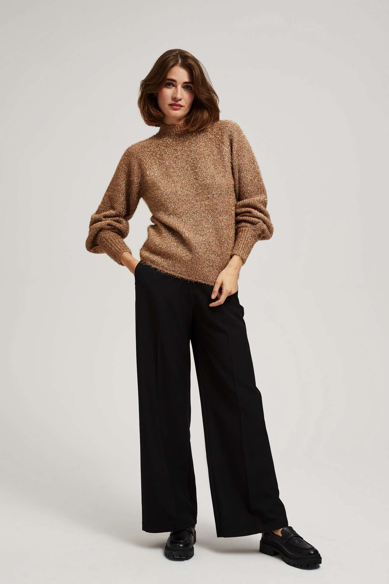 Turtleneck sweater decorated with metallic thread