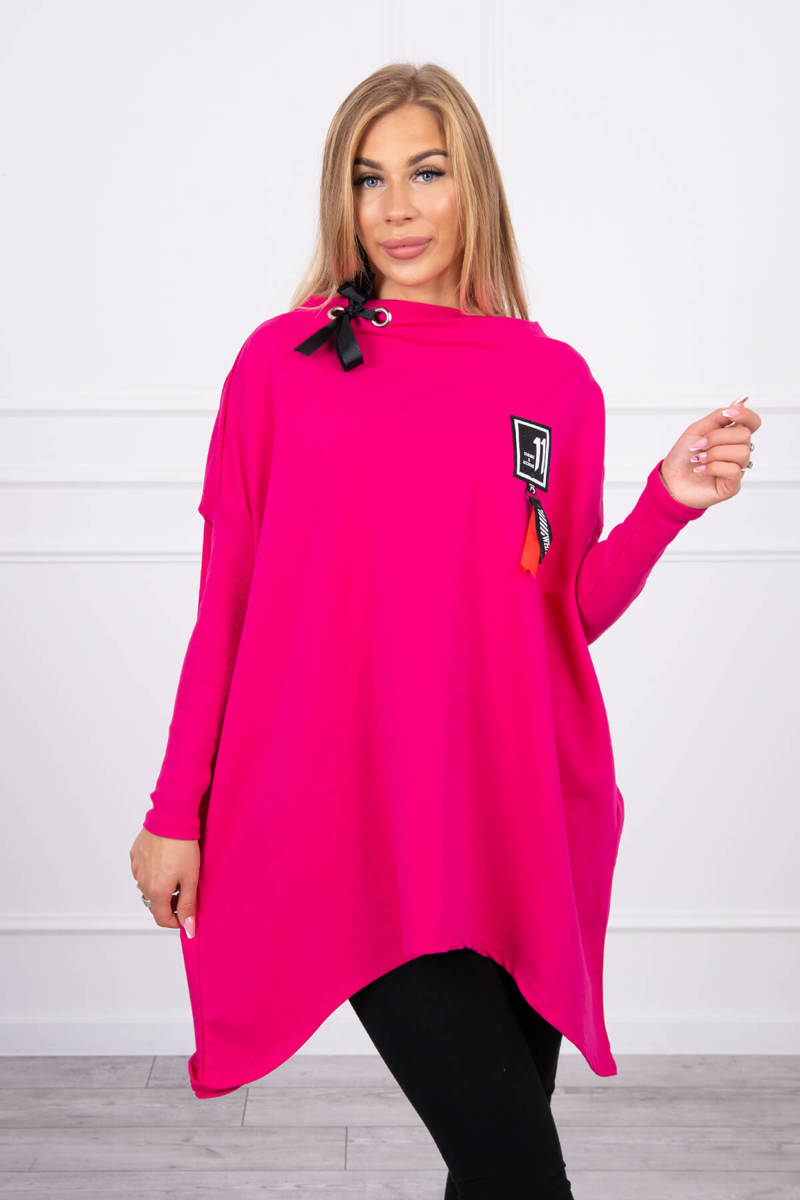 Oversize sweatshirt with asymmetrical sides of fuchsia color