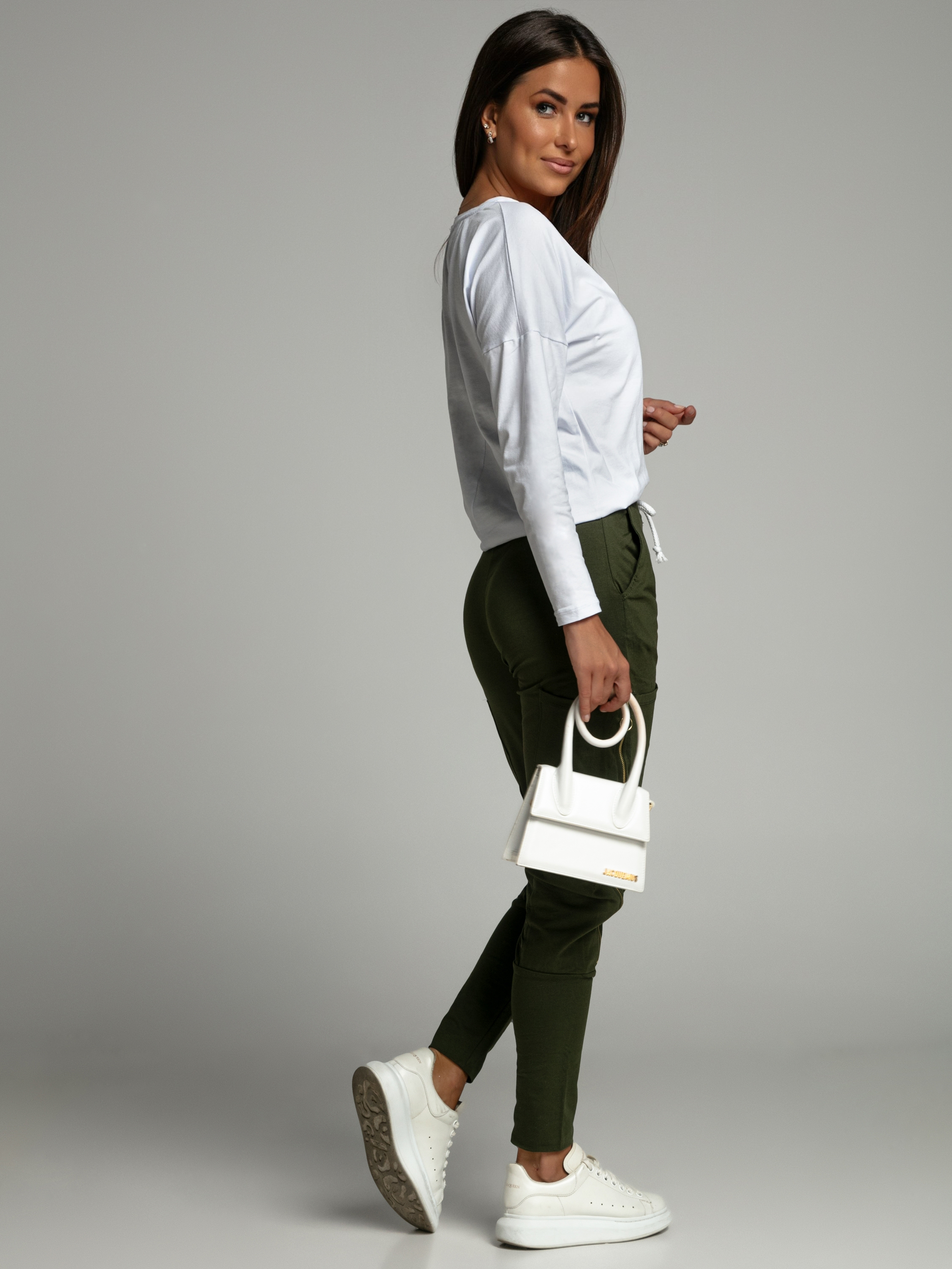 Set of women&#039;s cargo pants and white-khaki blouse