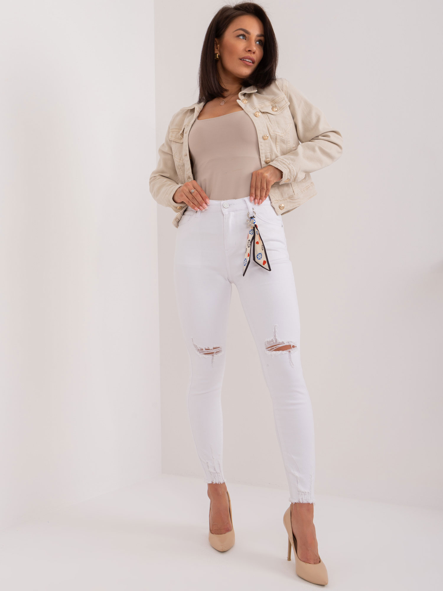 White fitted jeans with scuffs