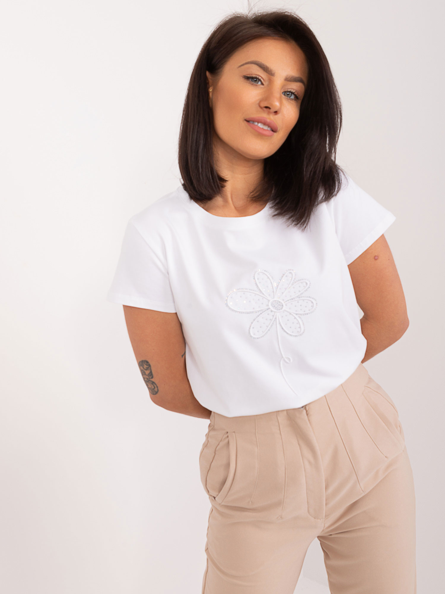 White blouse with BASIC FEEL GOOD patch