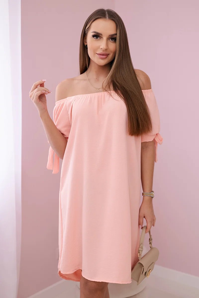 Dress with a tie on the sleeves apricot