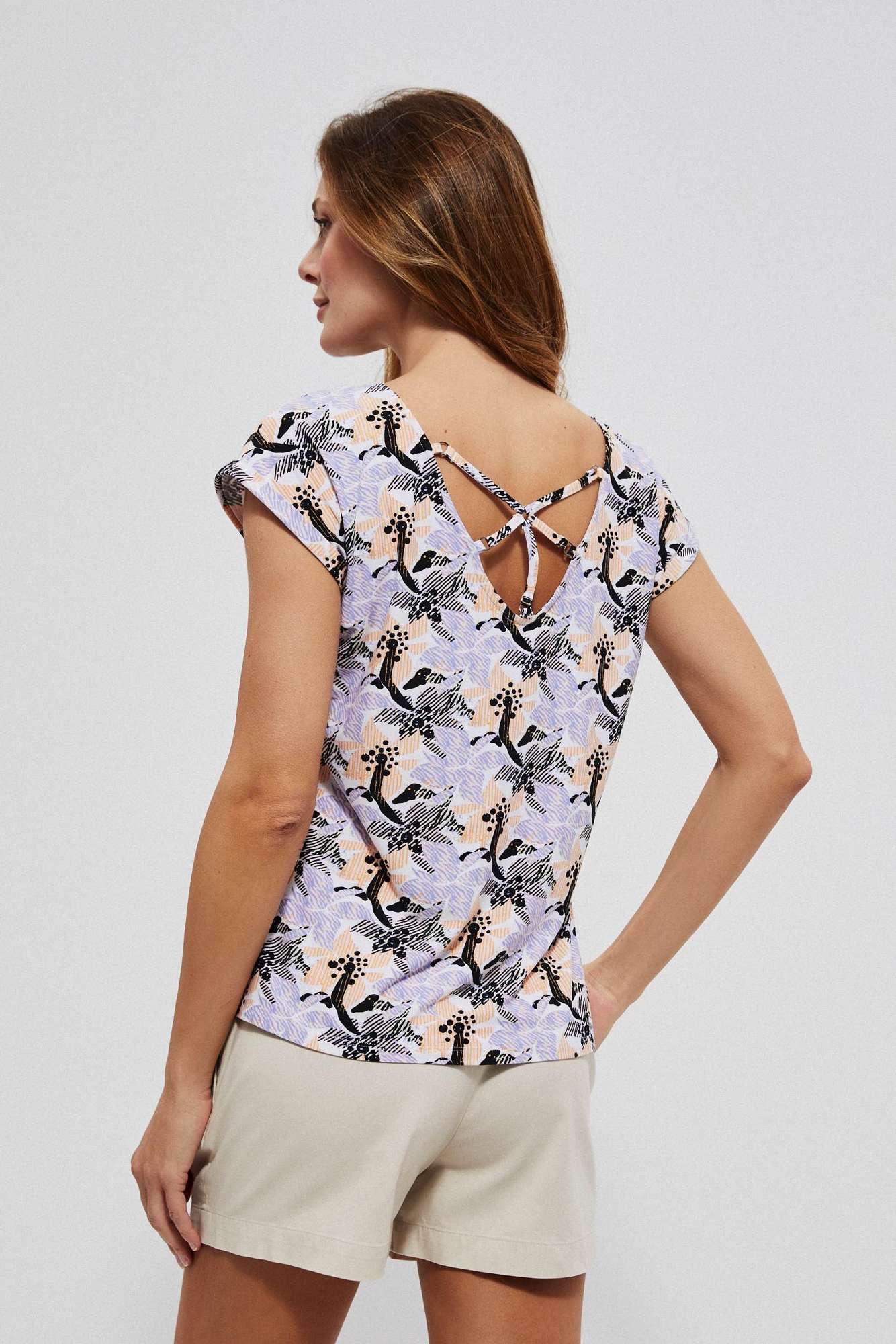 Blouse with decorative back