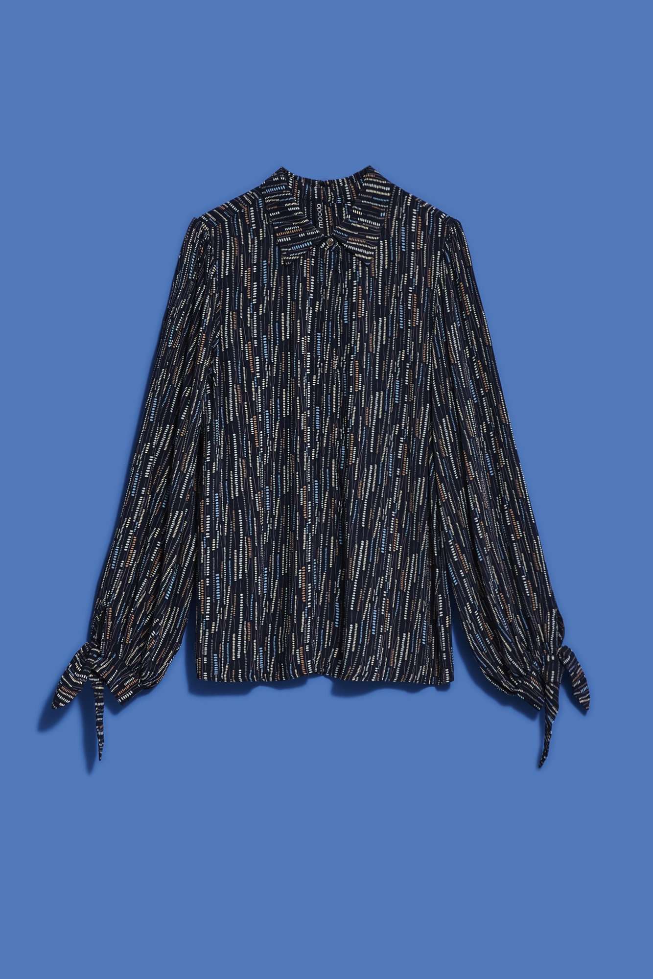 Women's shirt with tie on the sleeves