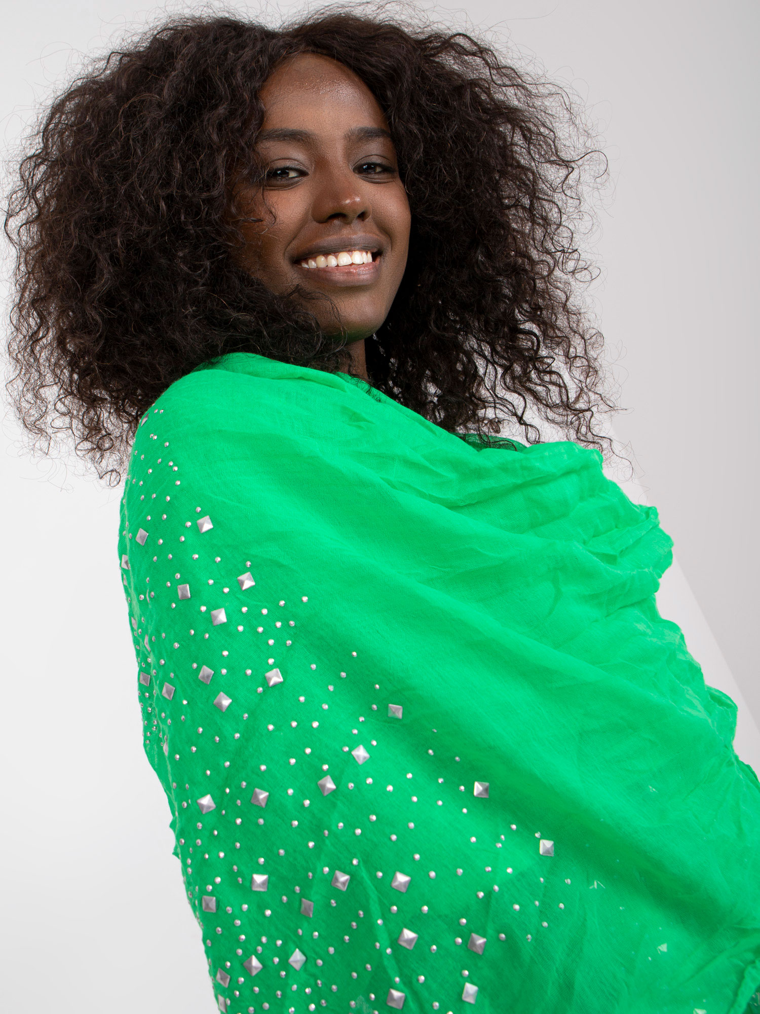 Green scarf with application of rhinestones