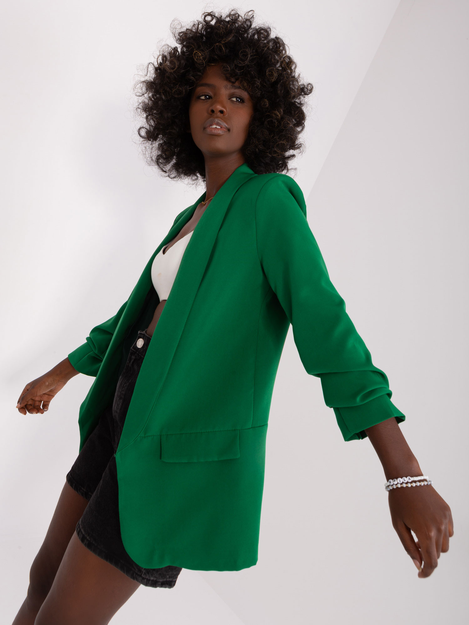 Lady's dark green jacket without fastening