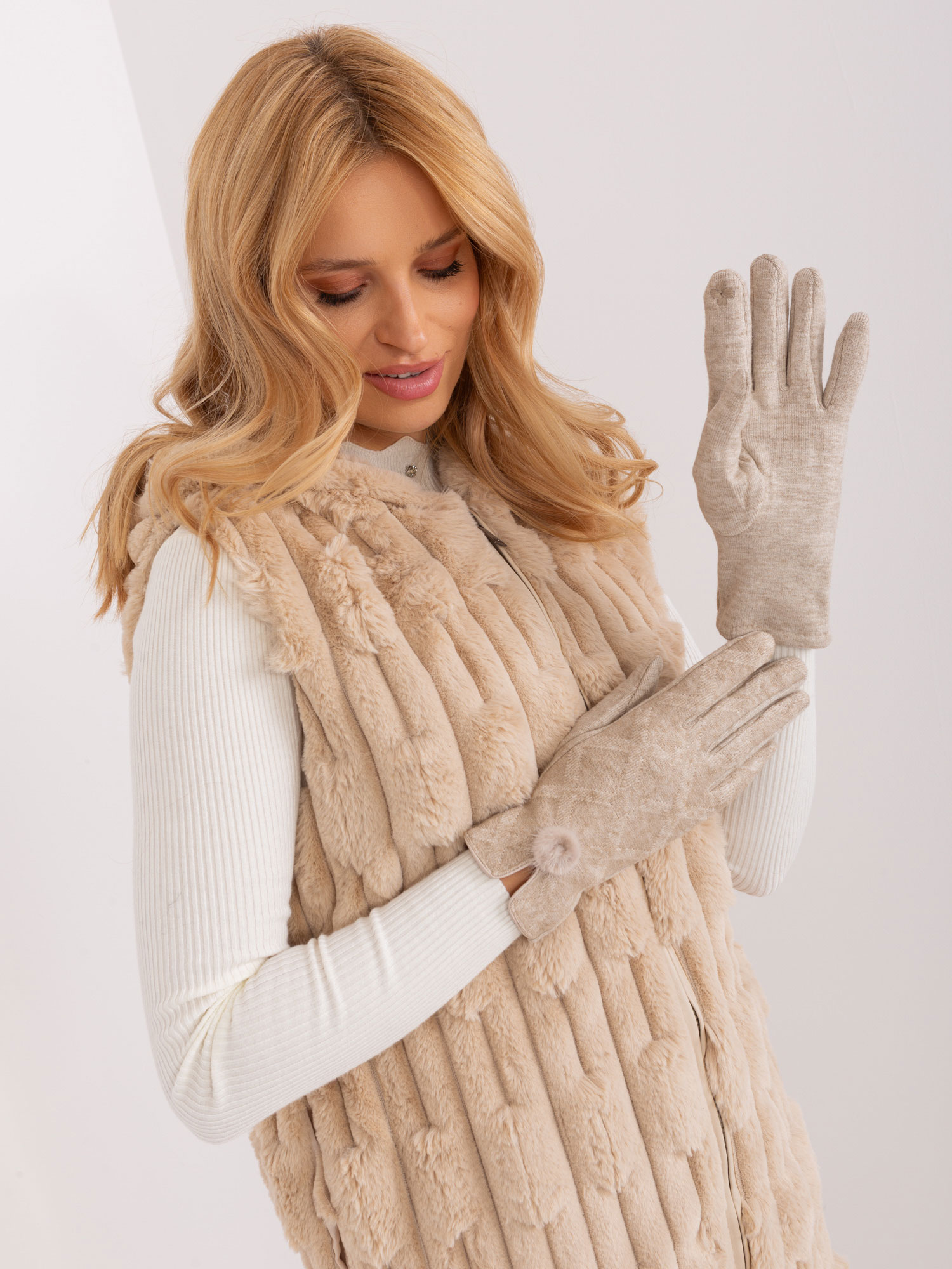 Beige women's gloves with pompom