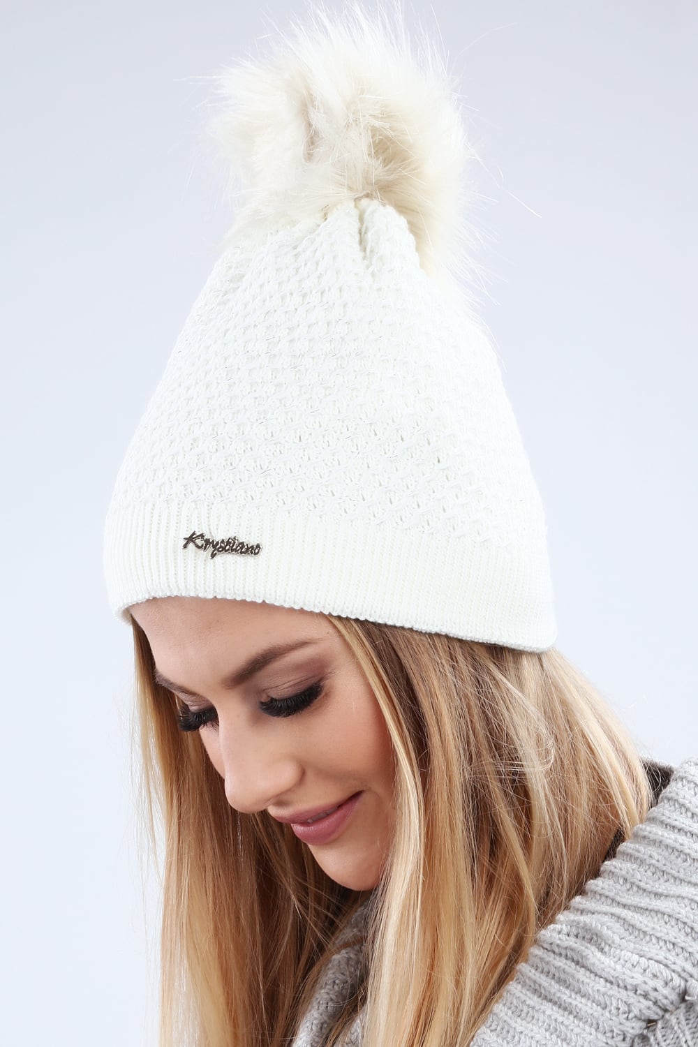 Cream cap with silver thread for the winter