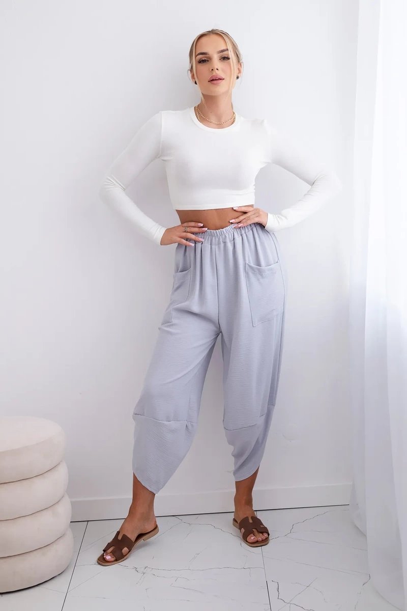 Grey trousers with wide legs and pockets