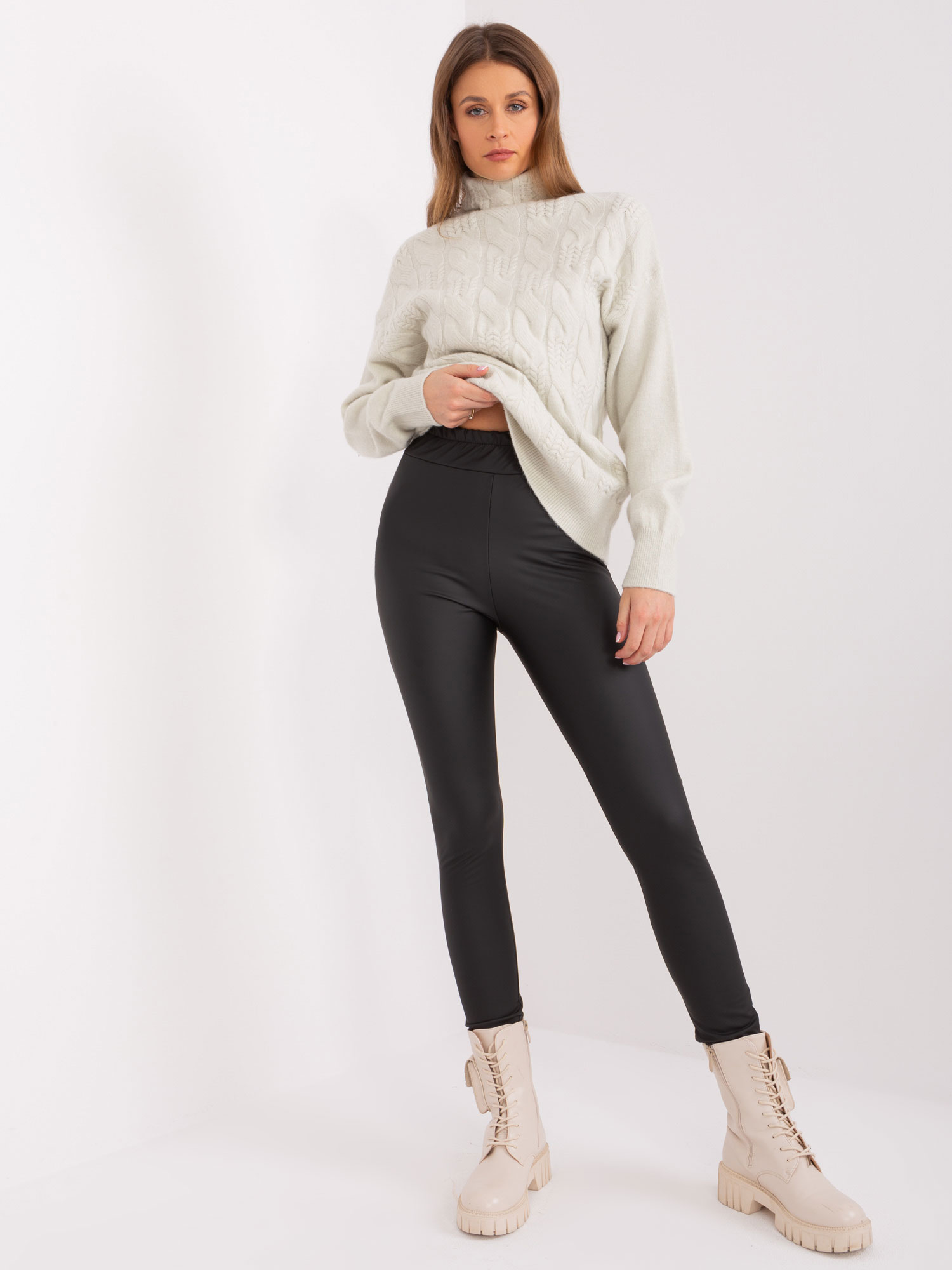 Black leggings made of eco-leather with insulation
