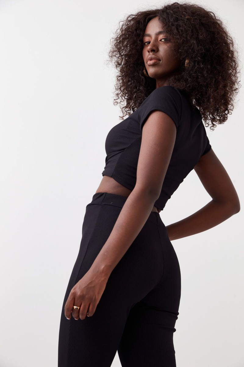 Striped women&#039;s blouse and trousers black