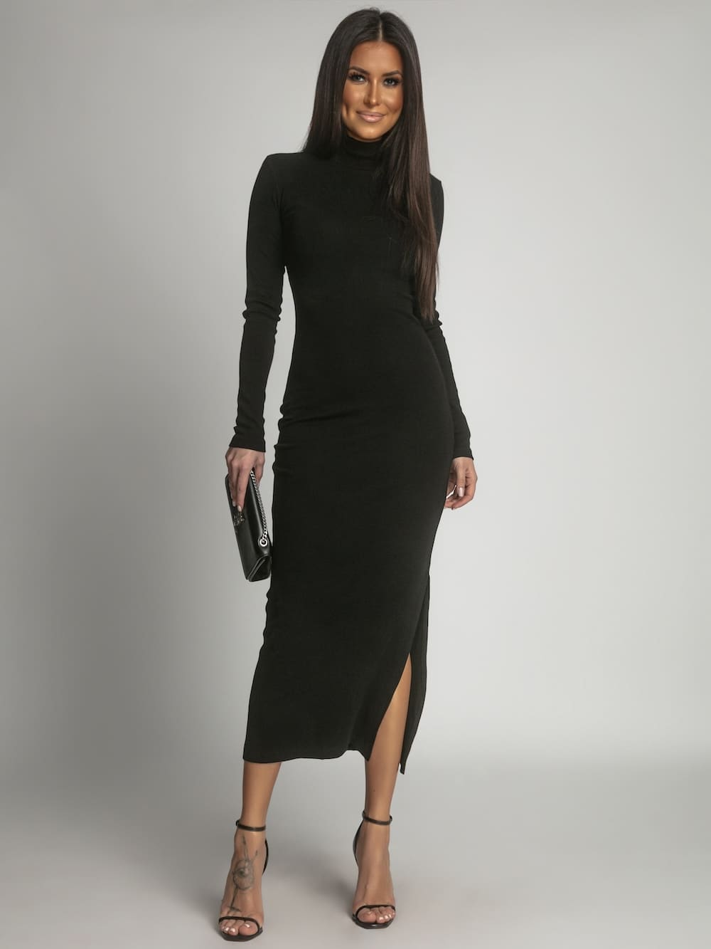 Black turtleneck maxi dress with side slit