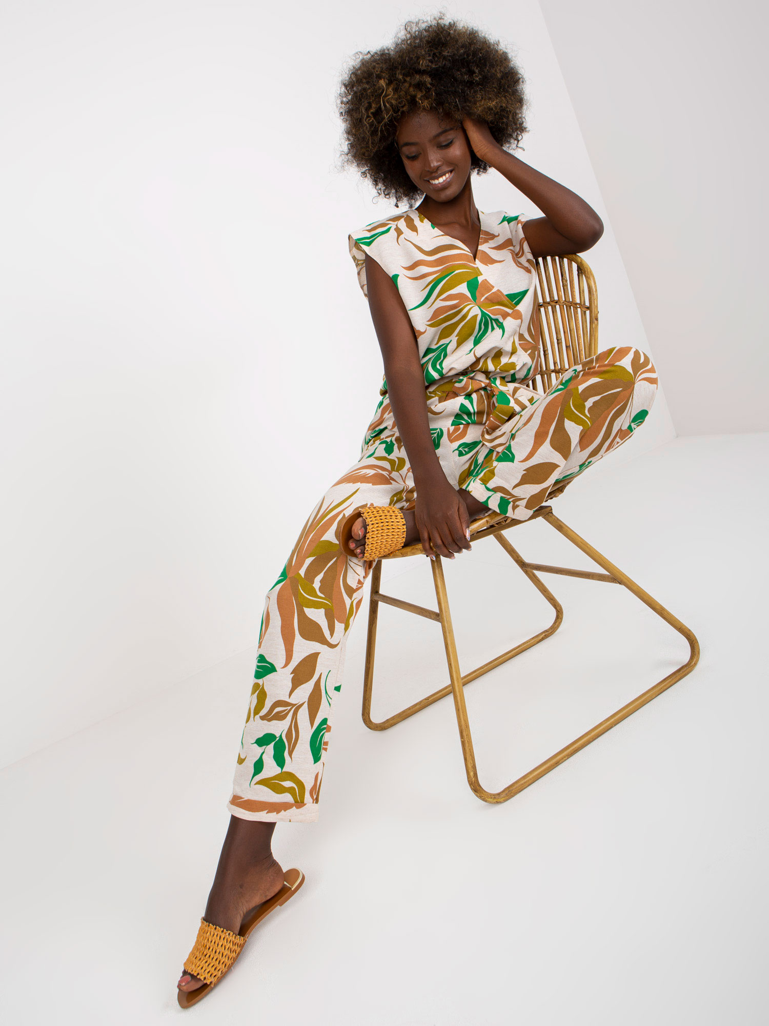 beige-and-green-linen-jumpsuit-with-a-print